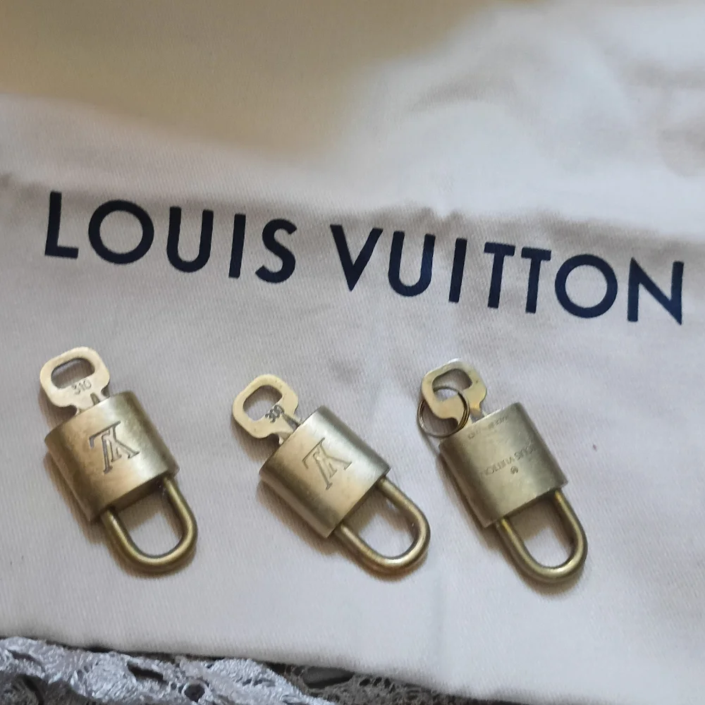 Authentic Louis Vuitton Lock & Key # 310 - Picture 6 of 11